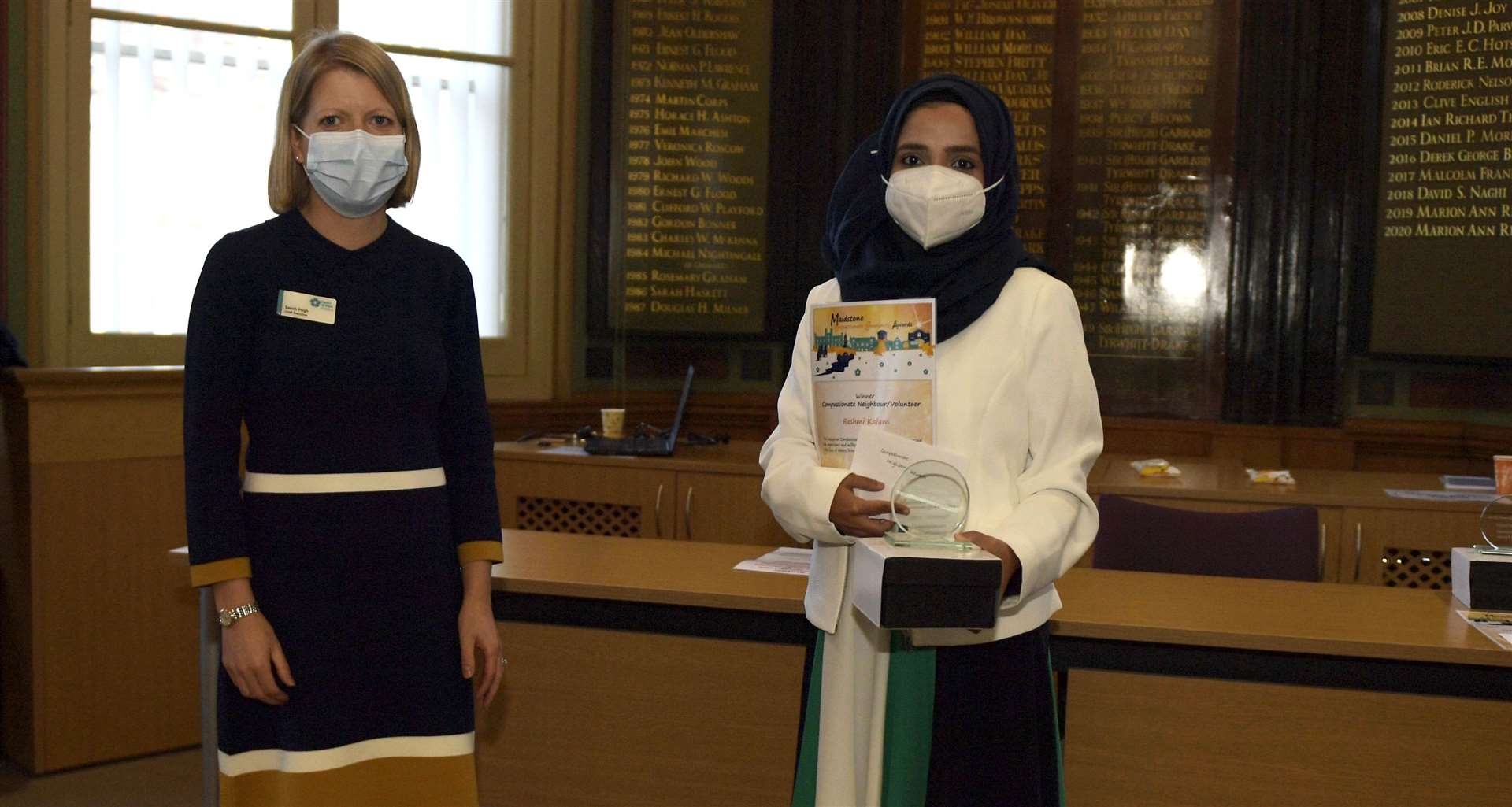 Mrs Kalam was presented with the compassionate neighbour award by Sarah Pugh from the Heart of Kent Hospice. Picture: Barry Goodwin