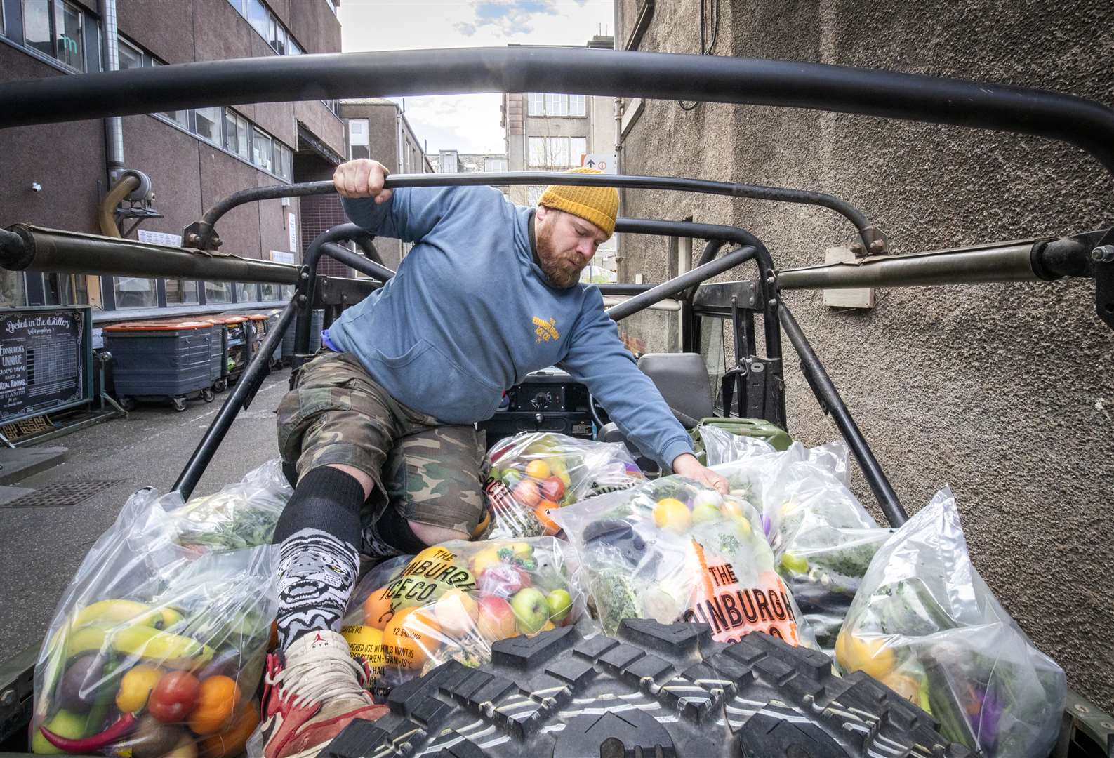 Rhys Ferguson from the Edinburgh Ice Company at Summerhall gets stuck in (Jane Barlow/PA)