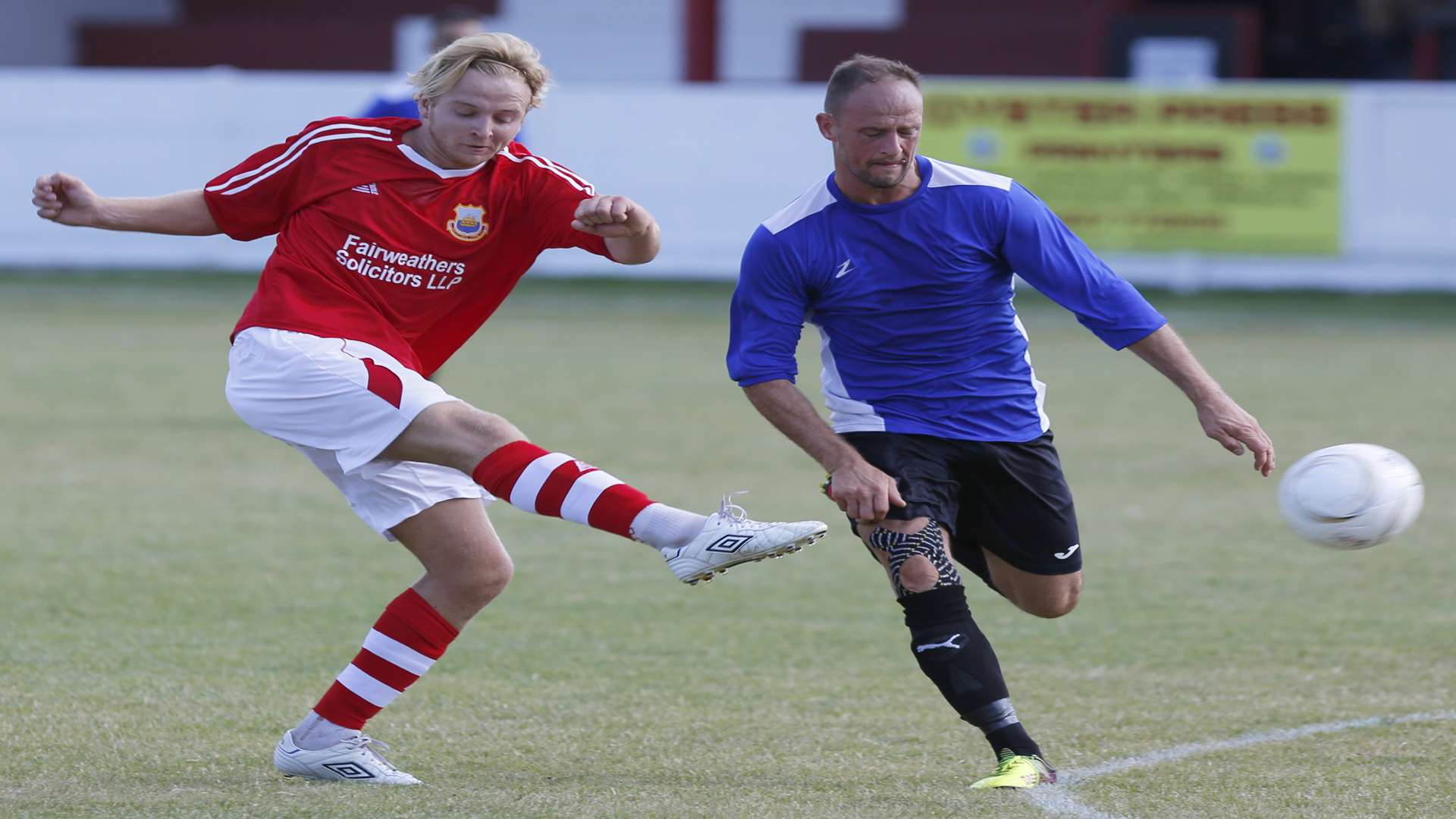 Whitstable, red, saw off Oakwood in the extra preliminary round of this season's FA Cup. Picture: Andy Jones