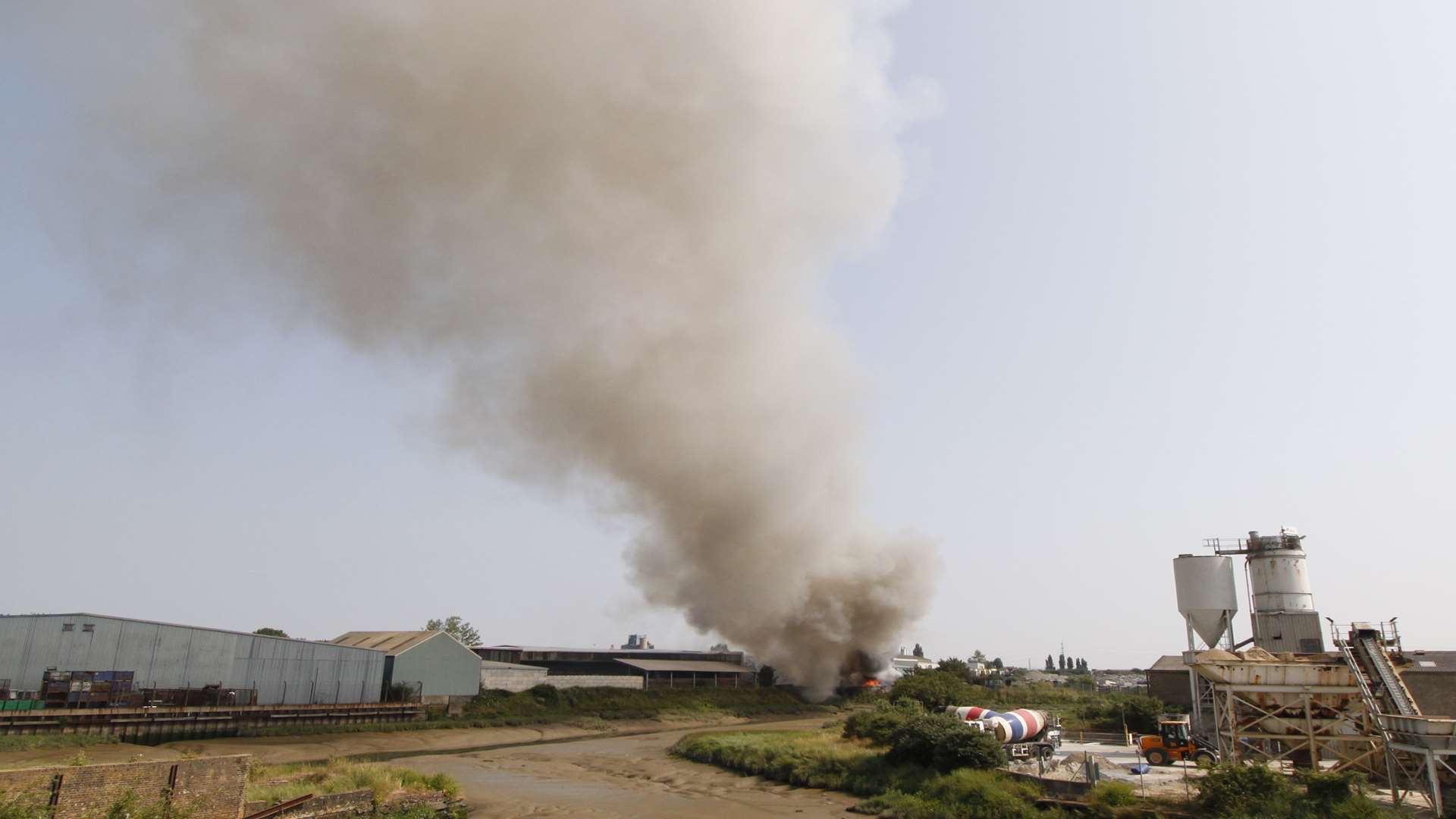 Smoke turns grey as firefighters appeared to start to begin the blaze in Milton Regis under control. Picture: Paul Gray