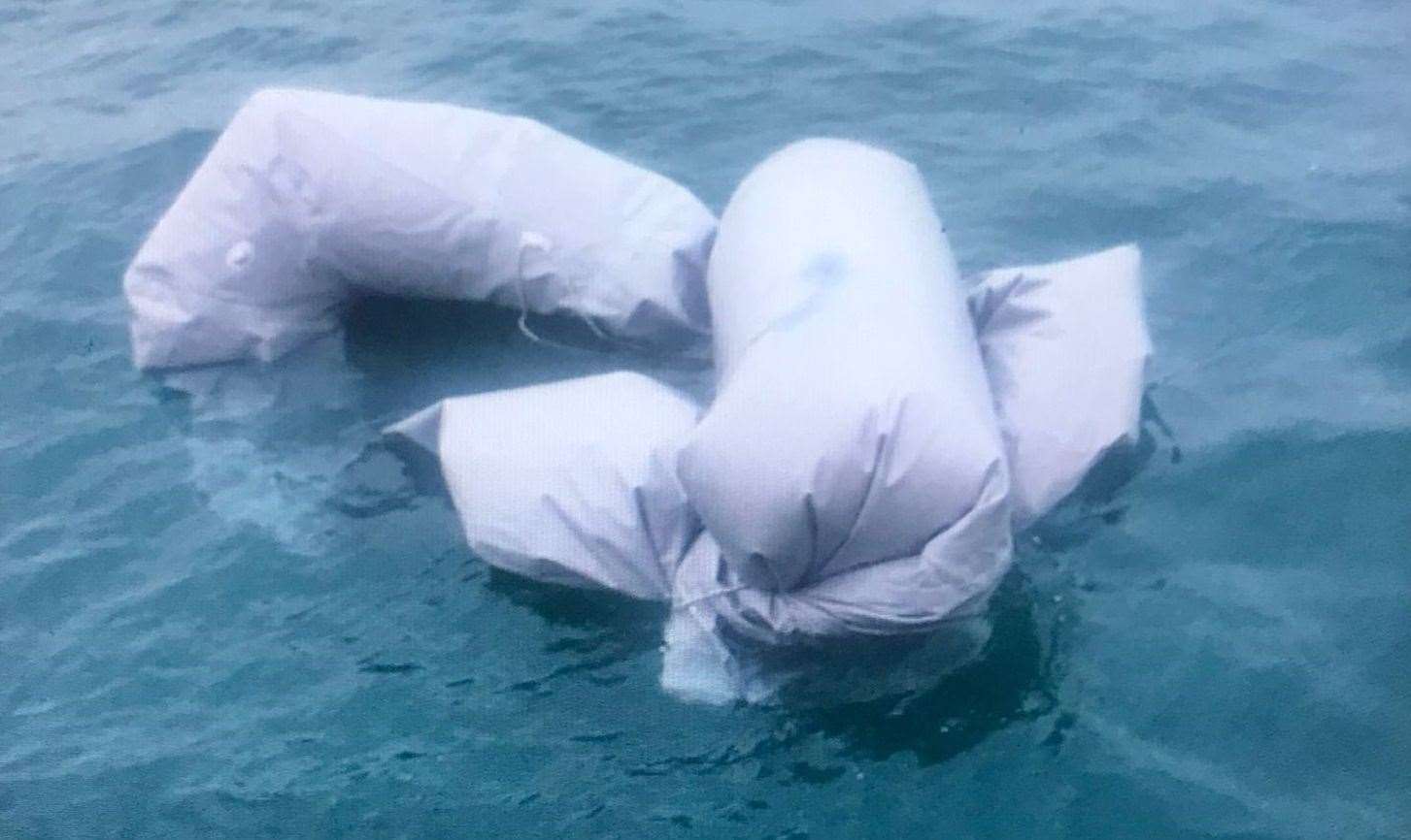 The dinghy in which more than 30 people attempted to cross the Channel in