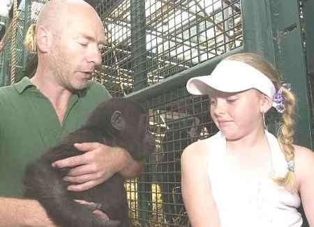 Emily Lofting, from Hythe, with keeper Colin Angus and friend. Picture: CHRIS DAVEY