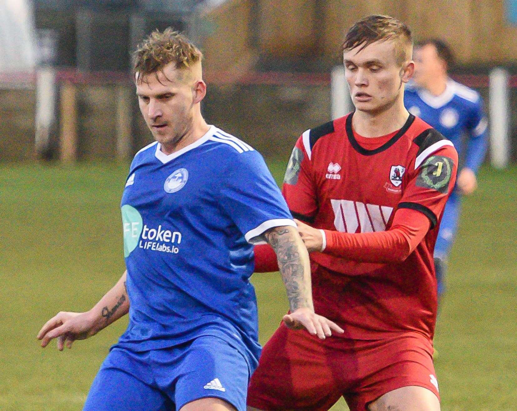 Hythe Town midfielder Danny Walder (blue shirt) Picture: Alan Langley