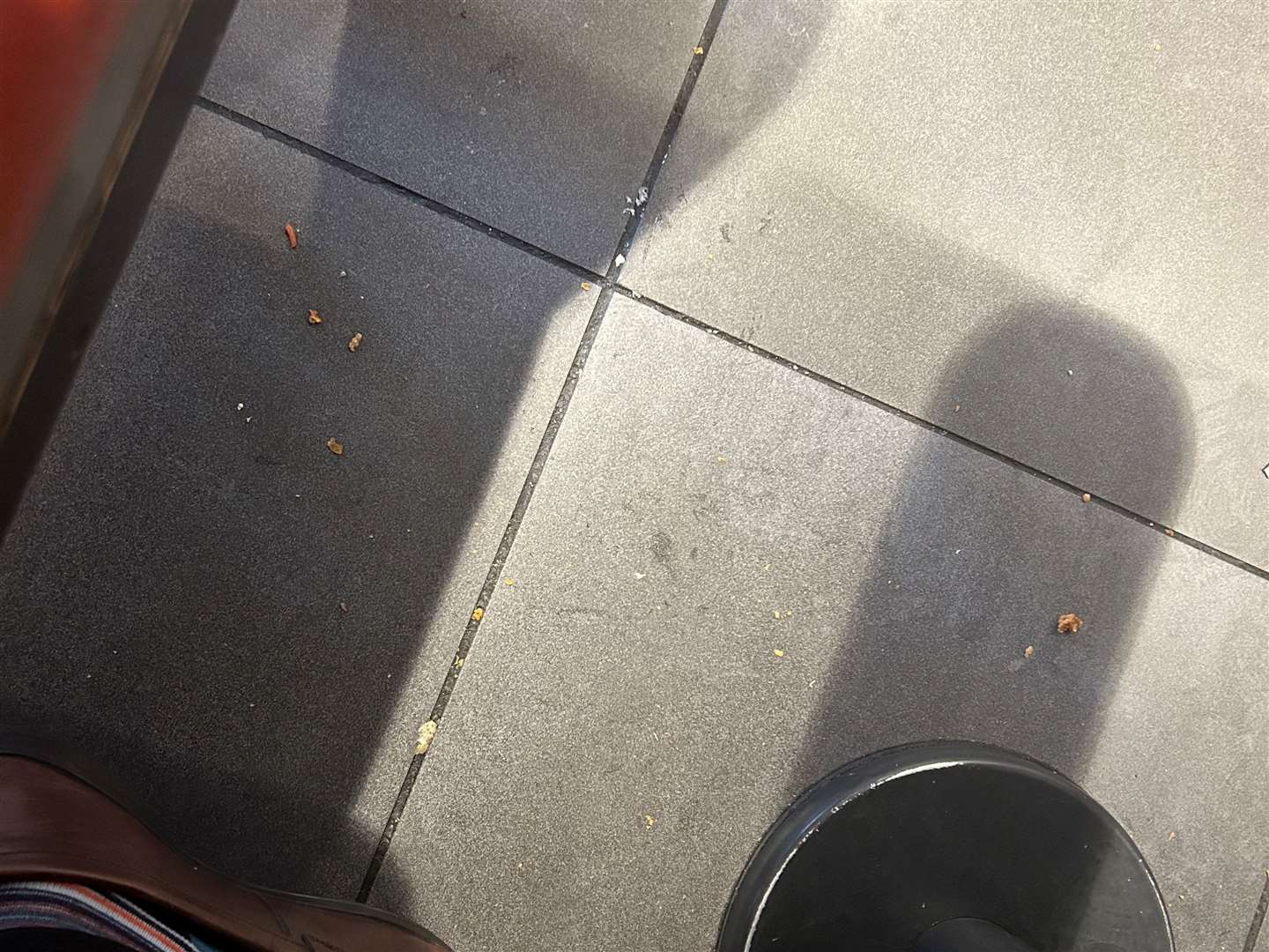 A few crumbs under the table