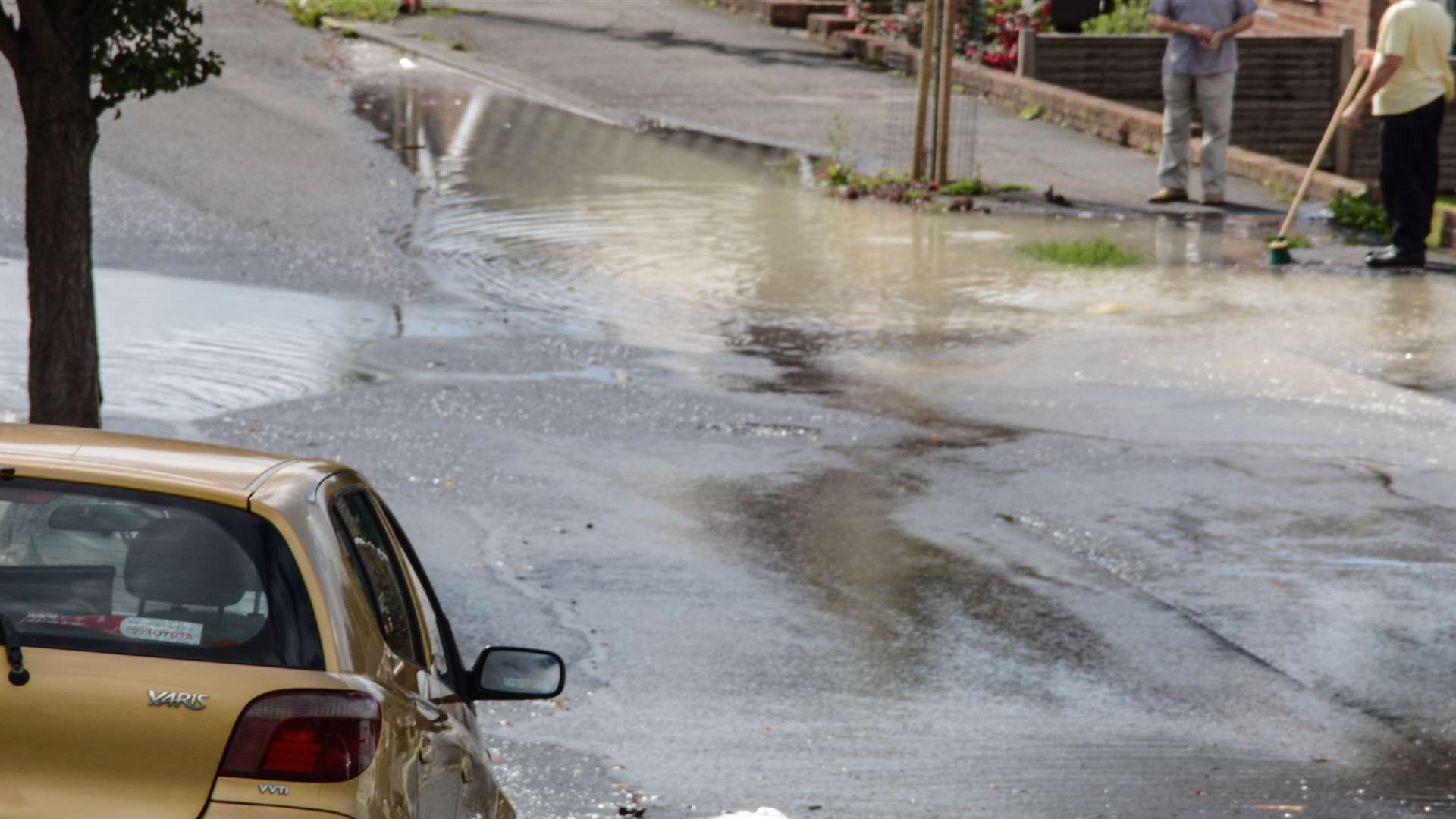 A flooded road. Credit: Jackie Andrews and Patrick Fowler in Downs Road