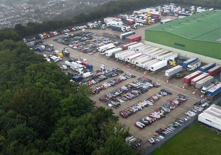 Boats used to cross the English Channel by people thought to be migrants are stored at a facility in Dover. Picture: (Gareth Fuller/PA)