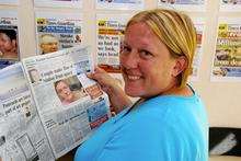 Karen Waller, 36, who claims she saw a UFO at Sheerness on Saturday evening, reading about our story in last week's paper.