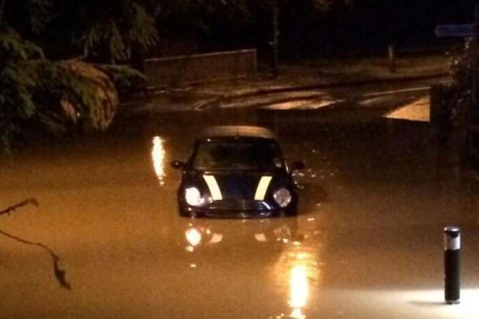 A Mini tackles heavy floods. Library picture