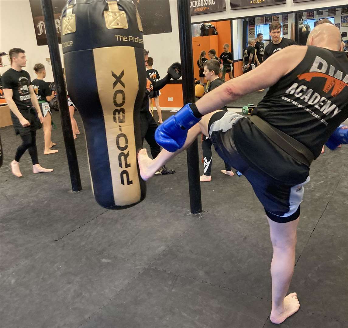 John Scott going through his black belt grading at the Paul Wiffen Academy