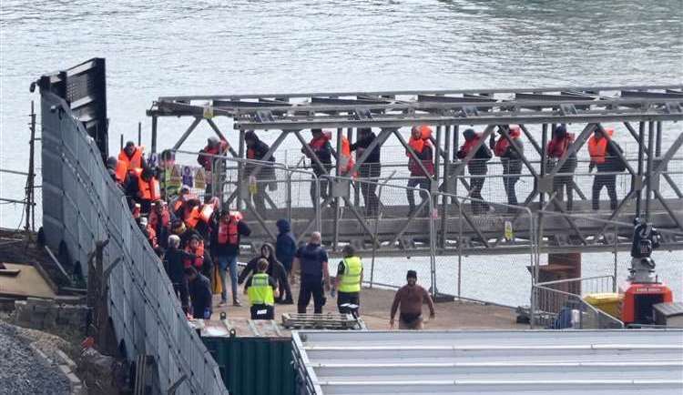 A group of people thought to be migrants are brought into Dover from a Border Force vessel (Gareth Fuller/PA)