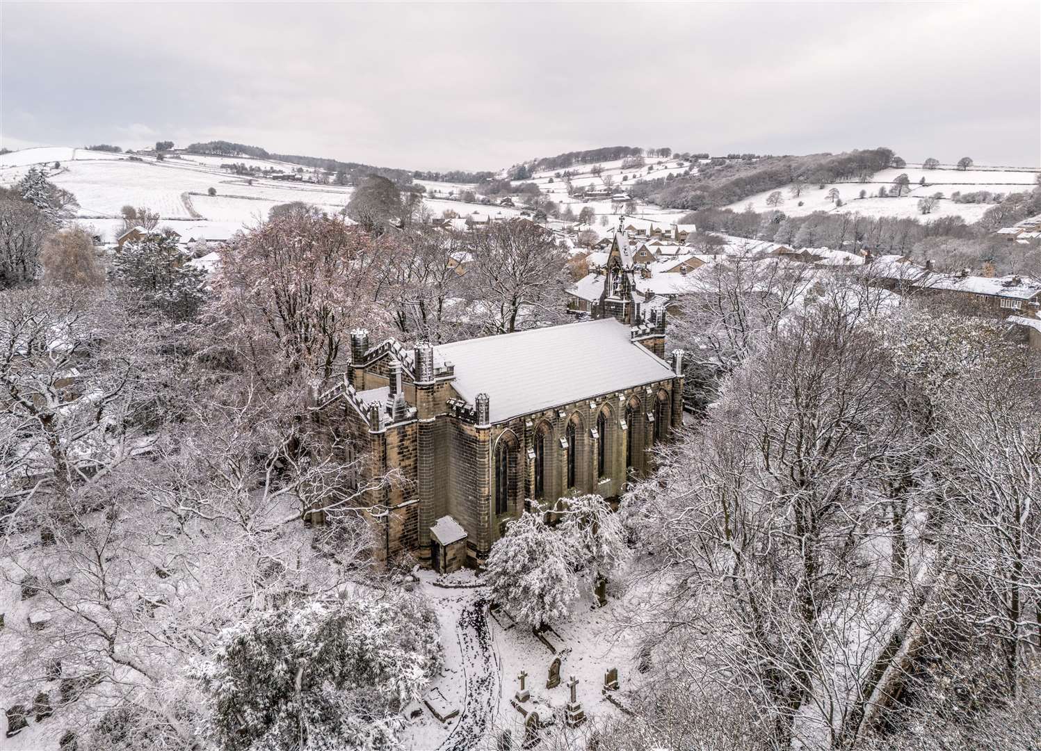 Snow surrounds All Saints Netherthong Church in Holmfirth, West Yorkshire (Danny Lawson/PA)