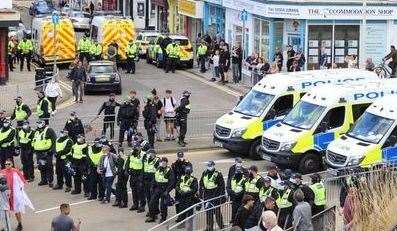 A man is led away after clashes between anti immigration protesters and Kent Police earlier this month Picture: Kevin Clark