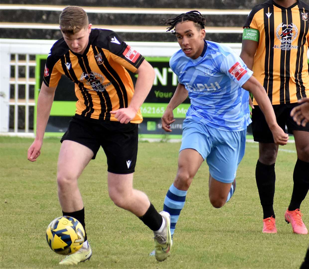 Right-back Elliott Moore drives forward for Folkestone. Picture: Randolph File