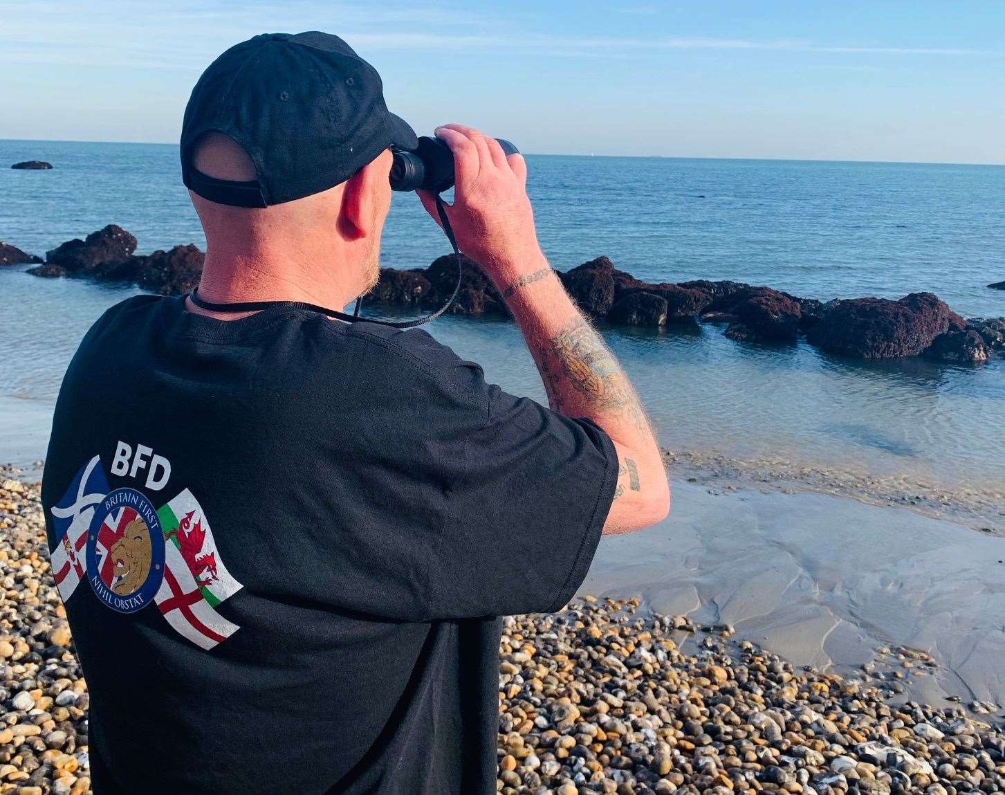 A Britain First member on beach patrol in Dover. Picture: Britain First