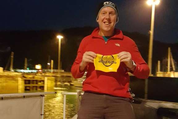 Endurance athlete Nick Thomas on the boat before setting off from Samphire Hoe yesterday morning. Picture: EnduromanEvents