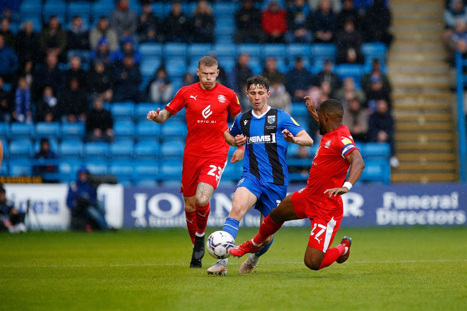 Gillingham midfielder Dan Adshead working hard Picture: Andy Jones