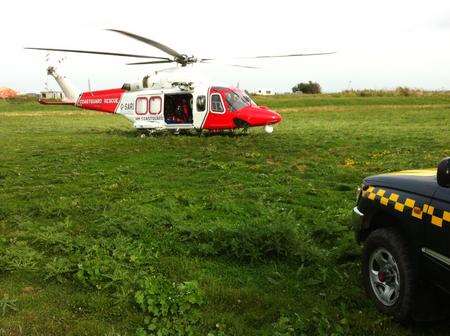 Coastguard Rescue 104 helicopter from Lee-on-the-Solent landing near Lower Stoke