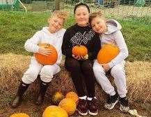 Nicky Lowther with brother Oliver and sister Phoebe at Halloween. Picture: Naomi Jarnell