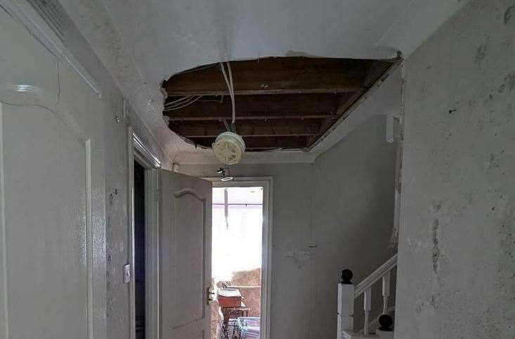 The ceiling is falling down in one of the hallways. Picture: Rightmove