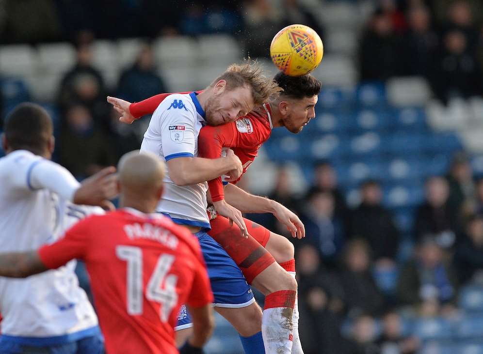 Conor Wilkinson challenges for the ball Picture: Ady Kerry