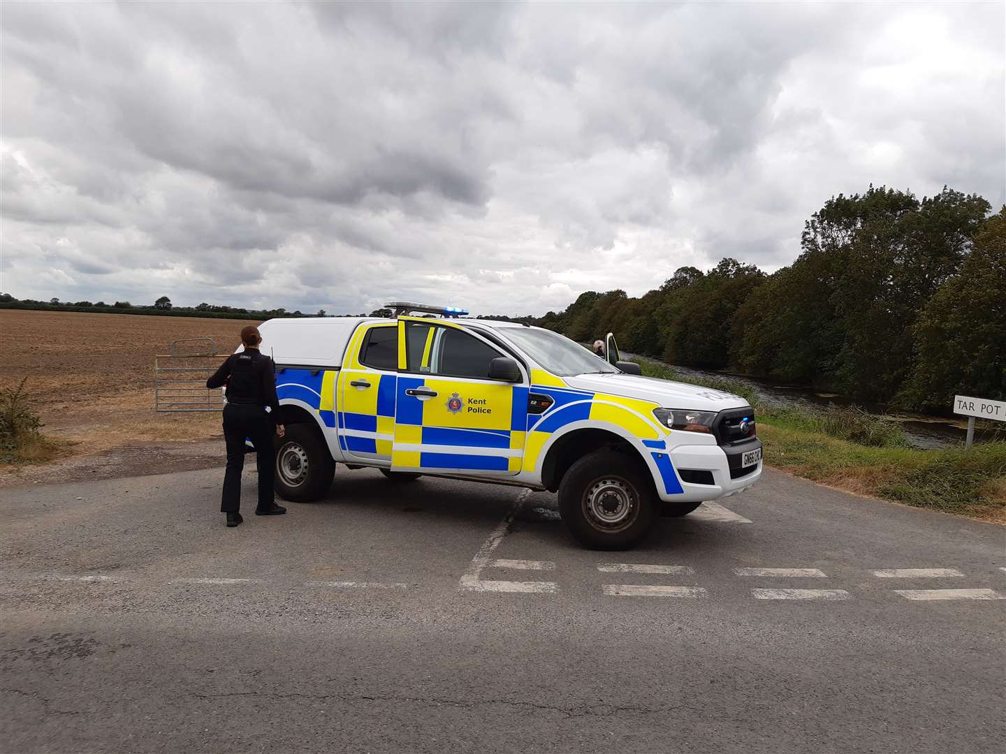 Police in Tar Pot Lane next to the Royal Military Canal