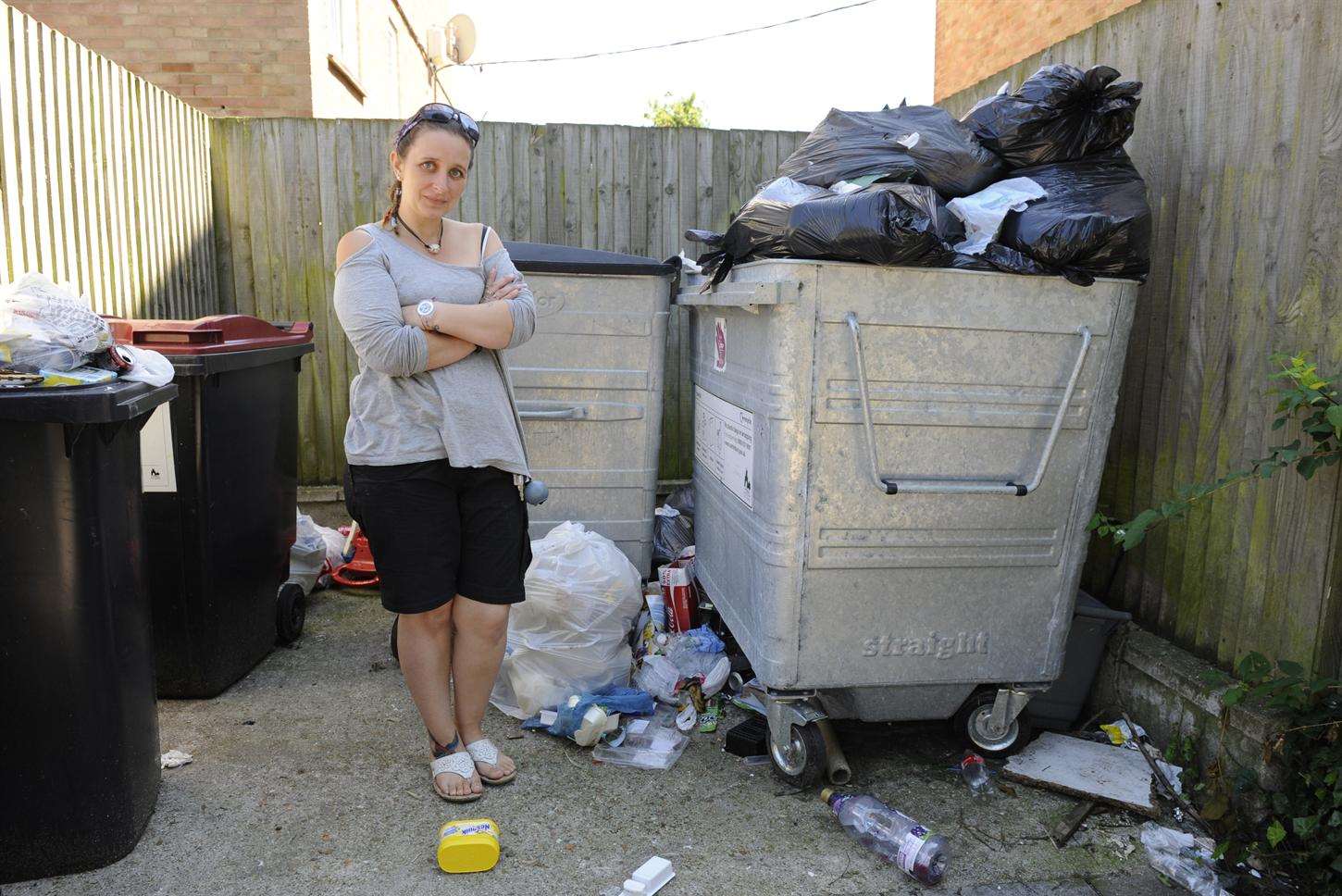 The rubbish left in the road attracts rats