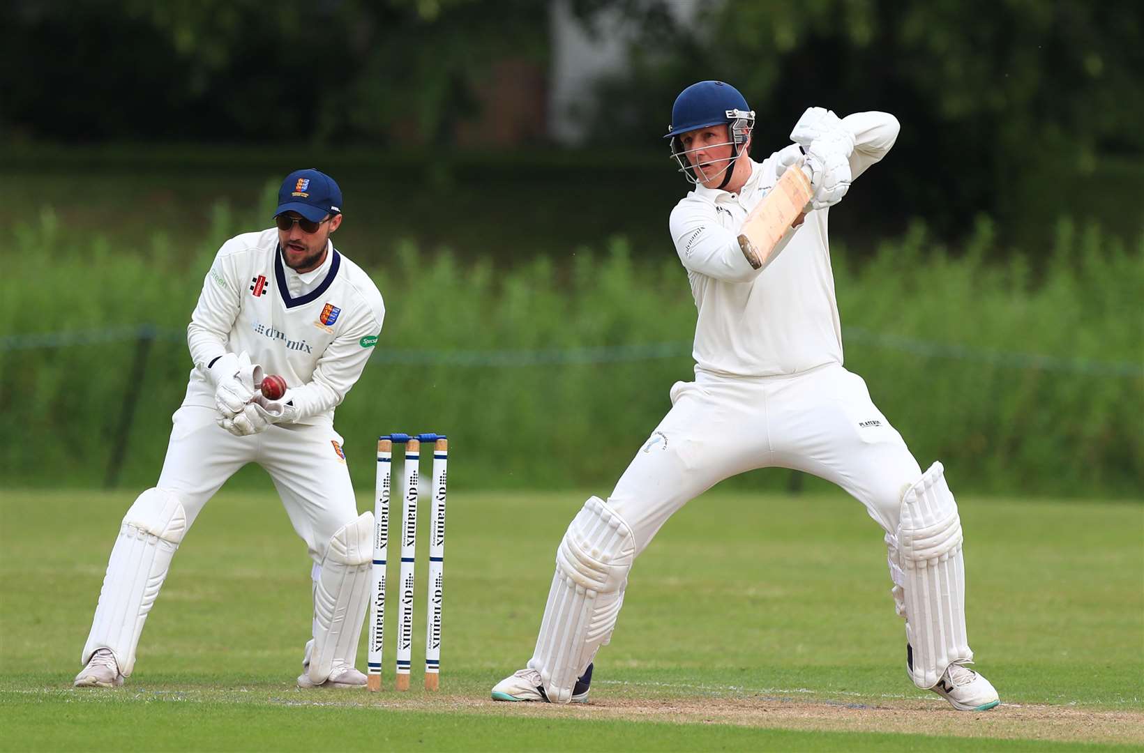 Opener John Grewar batting for St Lawrence & Highland Court, cutting through the offside ahead of Sandwich wicketkeeper Ryan Davies. Picture: Gary Restall