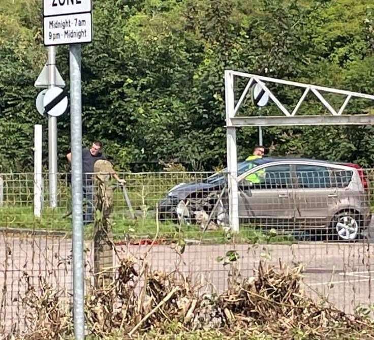 A vehicle crashed into and blocked the entrance to a car park on Ash Tree Lane, Chatham