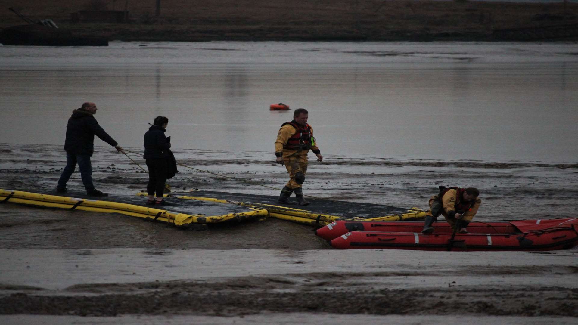 Daniel Bird and his daughter Lexi Reene are led to safety