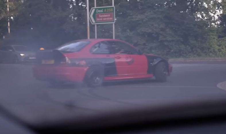 The souped-up BMW being ‘drifted’ around roundabouts on the A256 near Sandwich