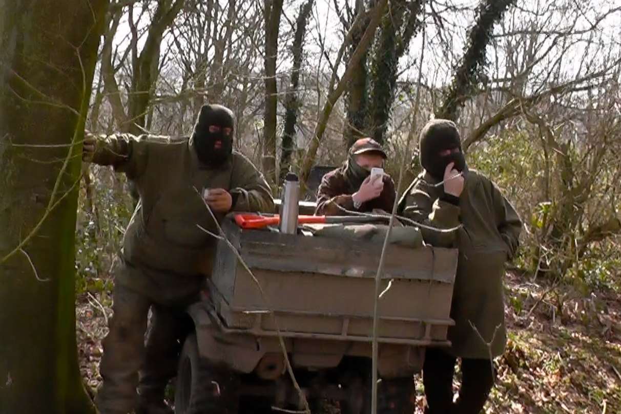 Terrier men dig out foxes that have gone underground.