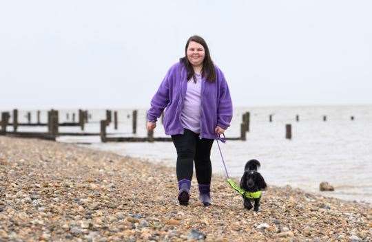 The medical and psychiatric assistance dog helps 20-year-old student Francesca every day. Picture: Butternut Box