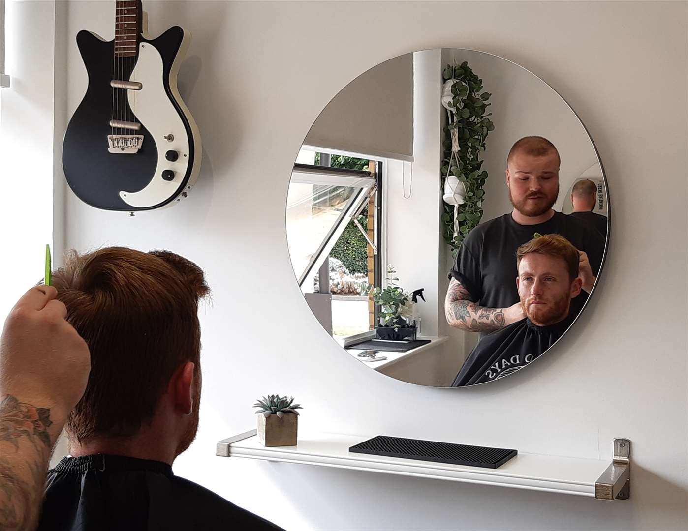 Reporter Sean Delaney gets a new haircut from Medway barber Jake Cox