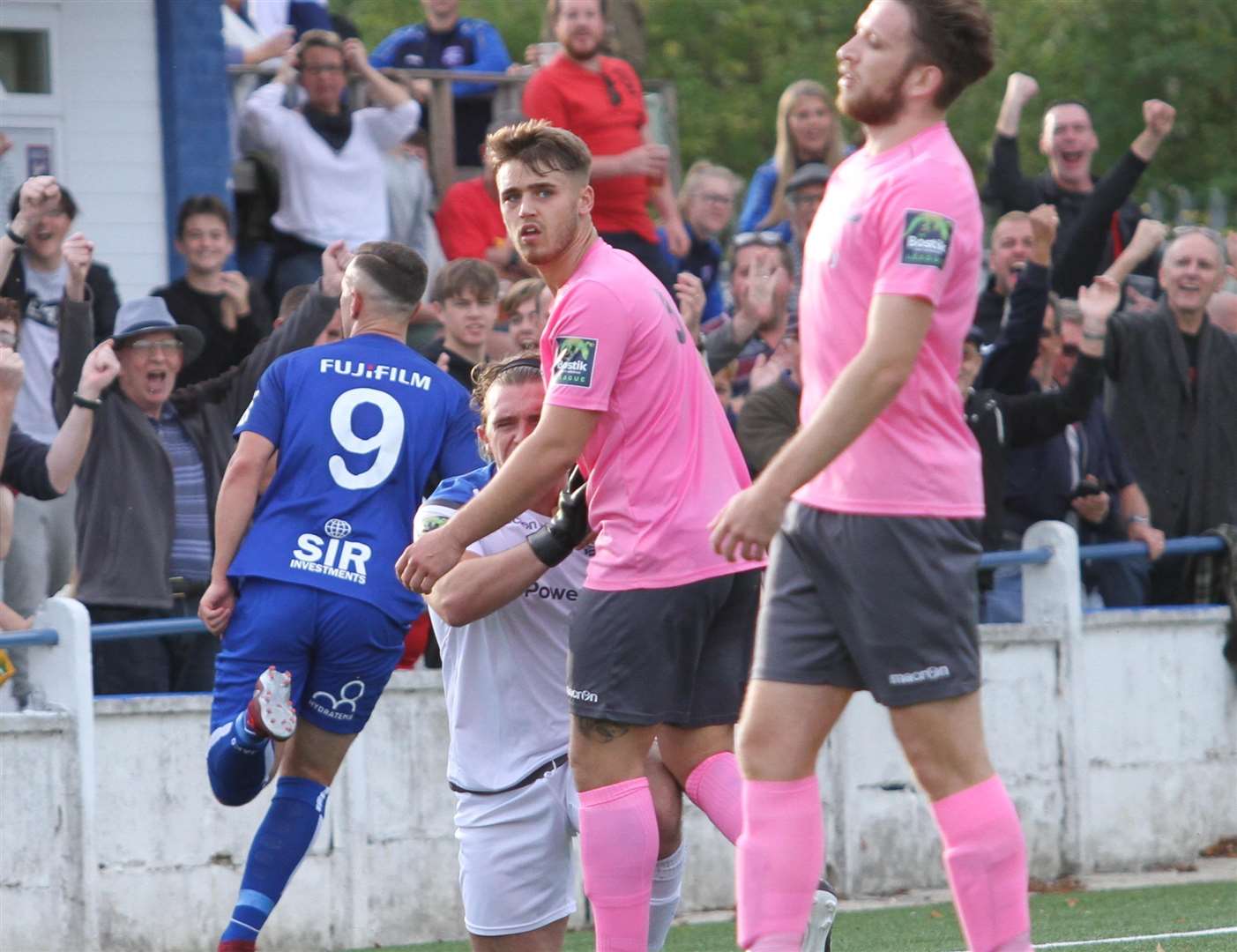 Joe Taylor wheels away after scoring the winner against Enfield Picture: Don Walker