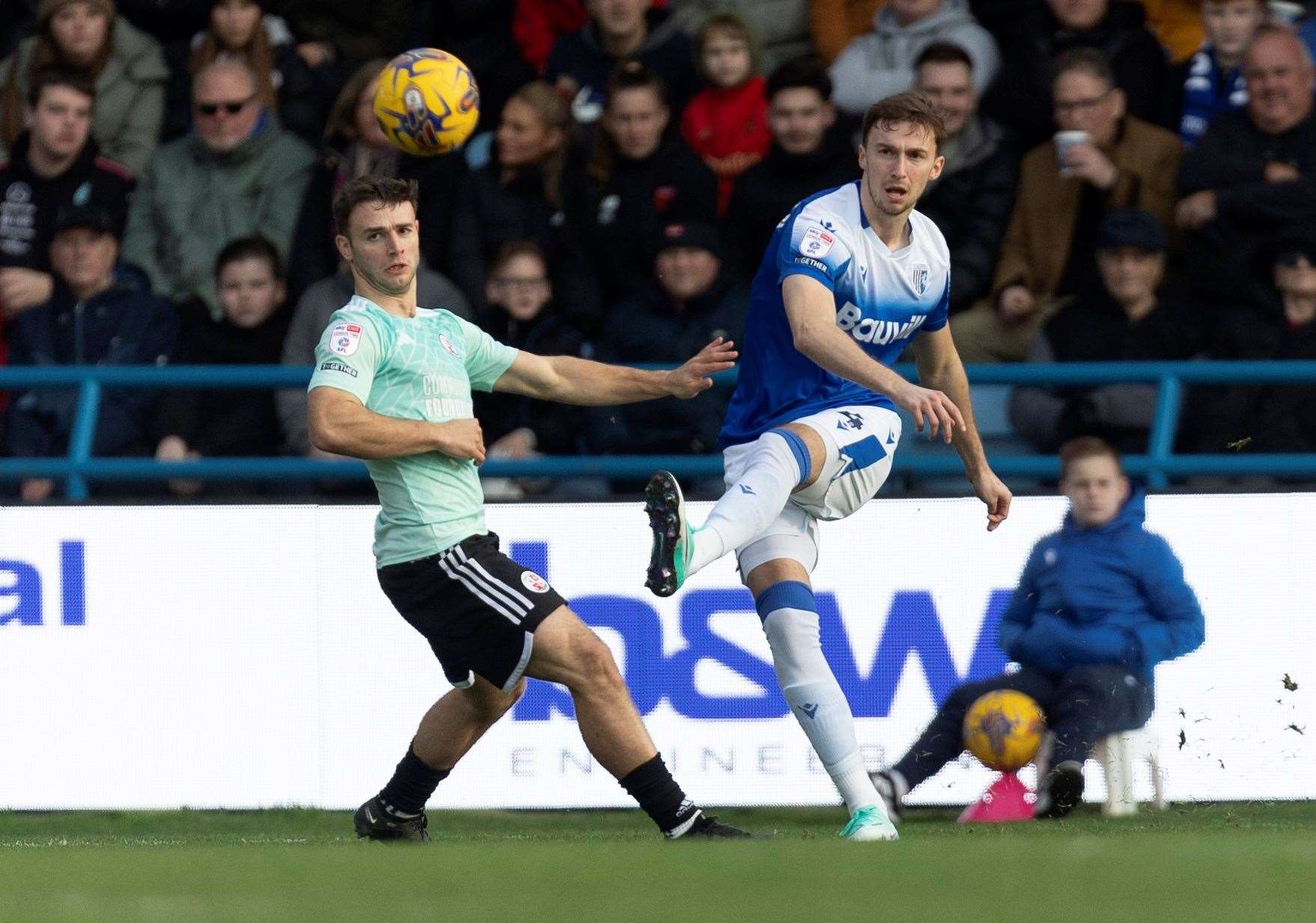 Conor Masterson clears out from the back during Gillingham’s defeat against Crawley Town Picture: @Julian_KPI