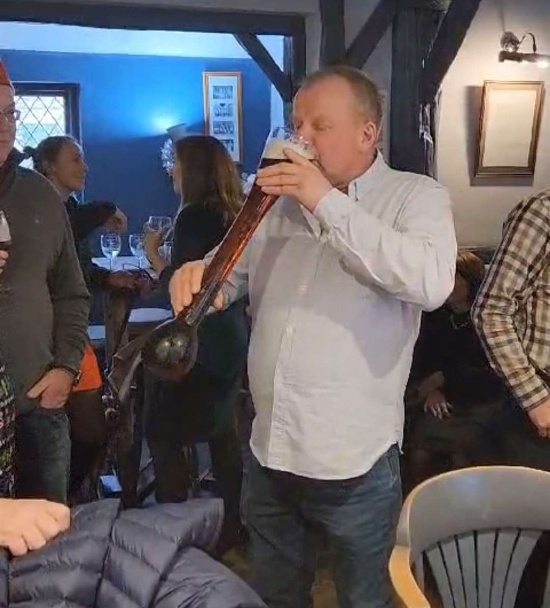 Richard Norris took on the yard of ale challenge at The Crown Inn at Finglesham, Deal on Christmas Day. Picture: Dave Beaney