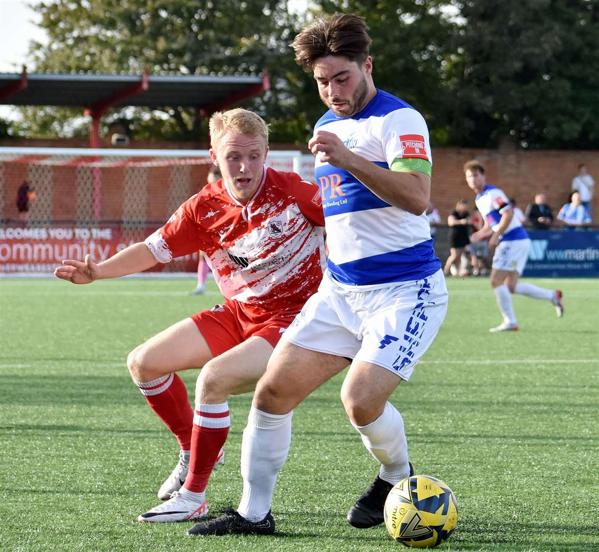 Sheppey skipper Richie Hamill takes on Ramsgate's Benedict Bioletti. Picture: Randolph File