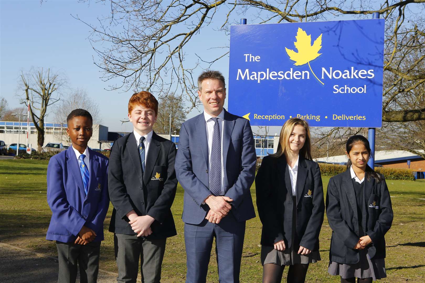 Head teacher Richard Owen with some of his pupils: Jerimiah, Ben, Emily and Farjana