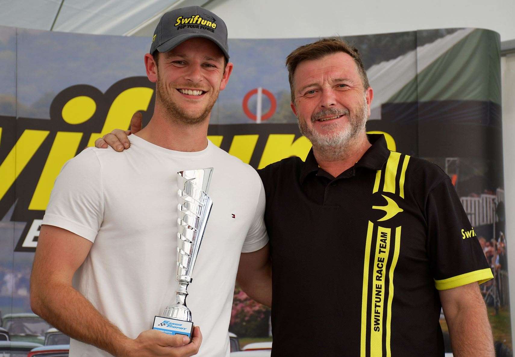 Heathcote and Nick Swift of Swiftune Engineering at the Sanwa Trophy podium. Swift, whose company powered 41 Minis at the event, thanked daughter Georgie for organising the races, which attracted a 34-car grid. Picture: Andy Gamble (Drive By Shooting)