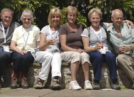 Some of the walkers relaxing at the finish. Picture: MATT McARDLE