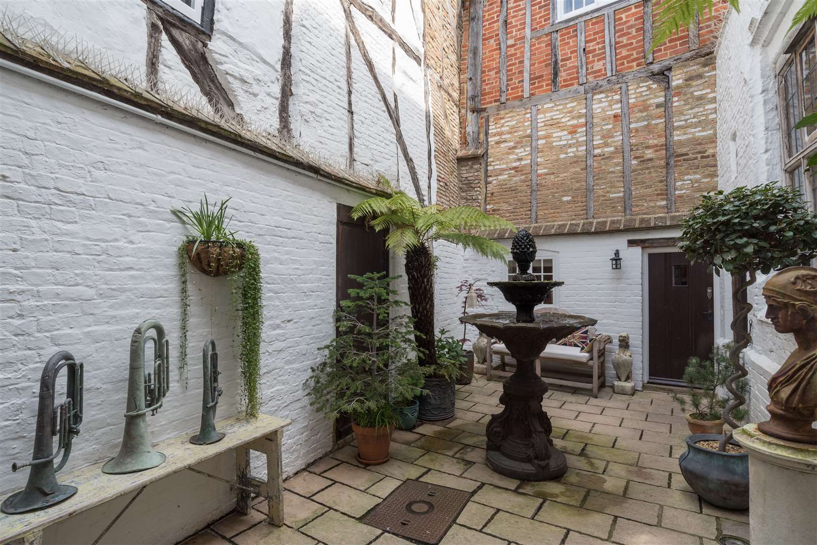 Historic Harfleet House even has beams in the courtyard garden Picture: Regal Estates