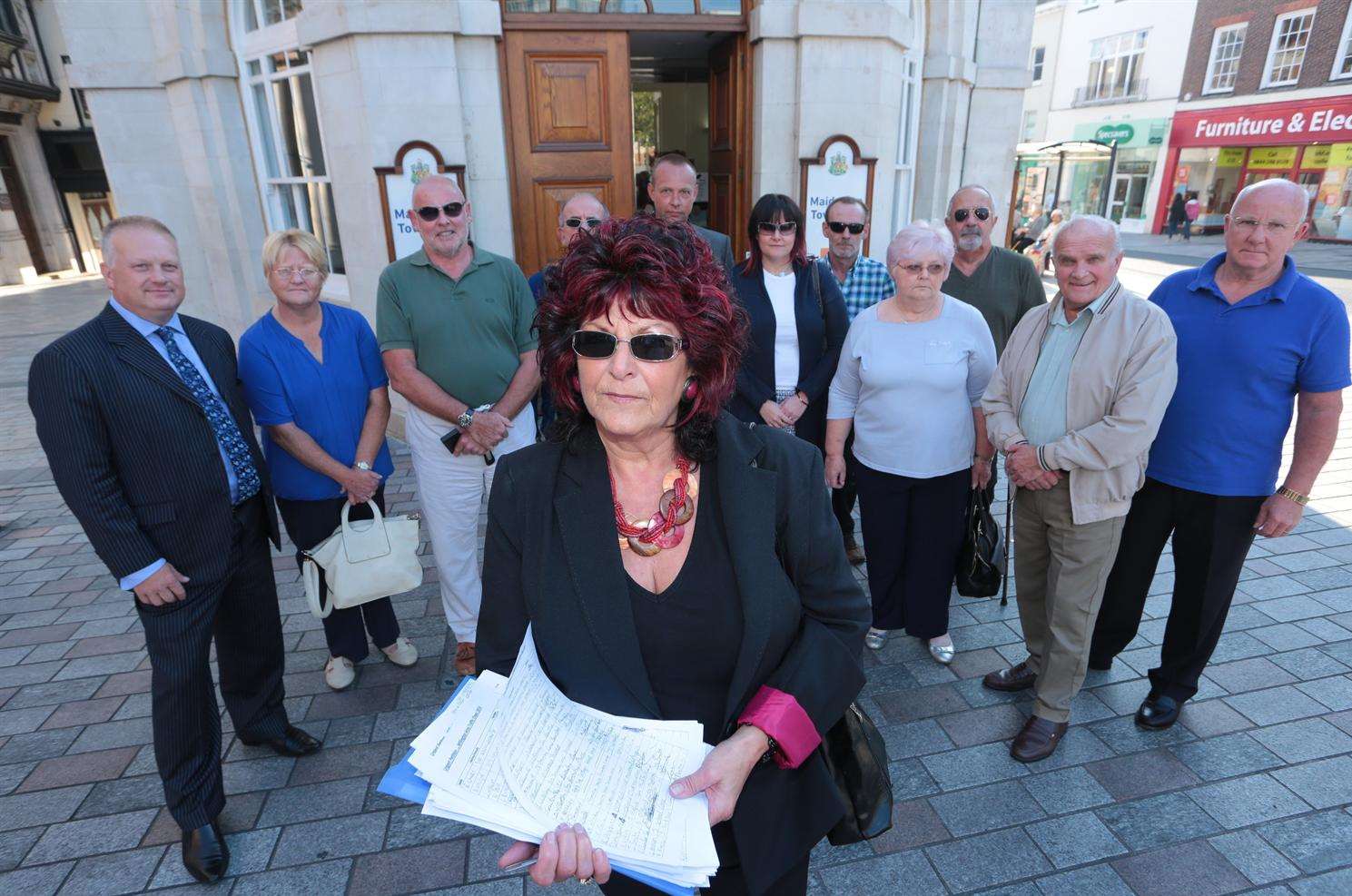 Jenny Sutton with campaigners from Willington Street gathered outside the hall before they present a petition against plans to reduce the weight limit through neighbouring village Leeds