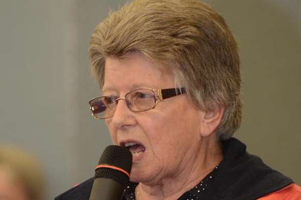 Retired nurse Peggy Prior asks questions at the meeting on the future of the Pilgrims Hospice in Canterbury held at Canterbury Academy on Friday evening.