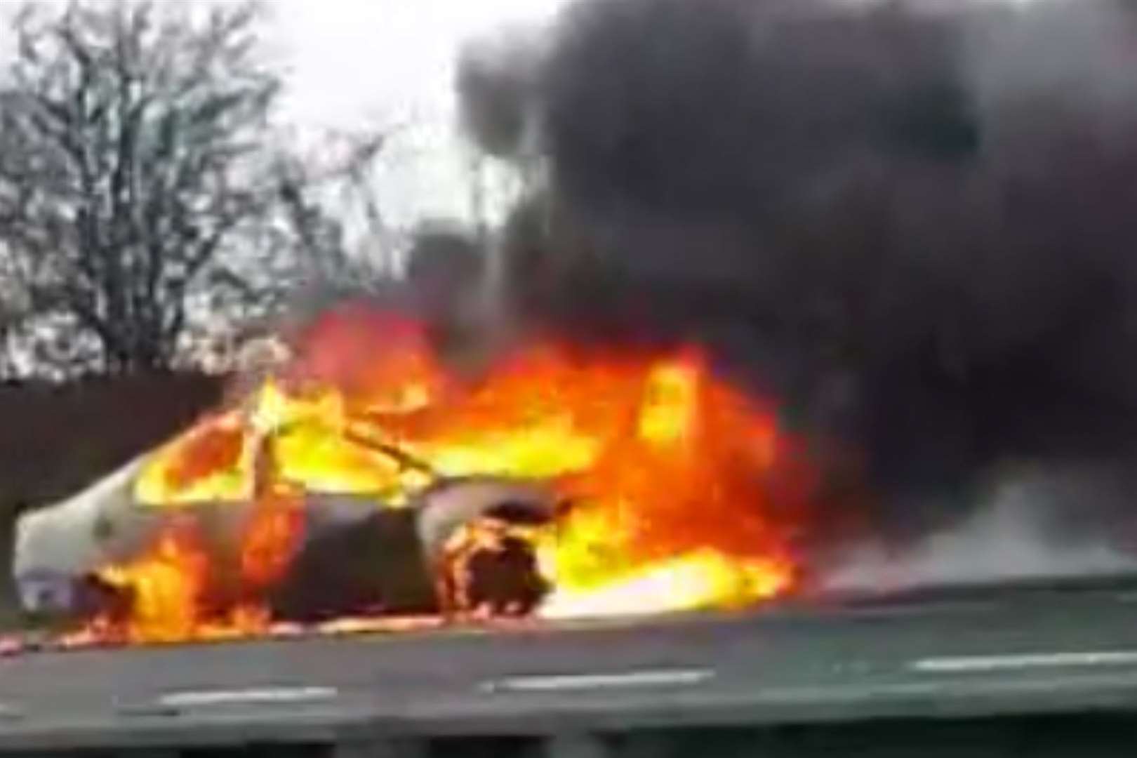 A car was on fire on the M2 between junction 3 and 4 on the coastbound carriageway earlier this evening. Picture: Lauren Bourke