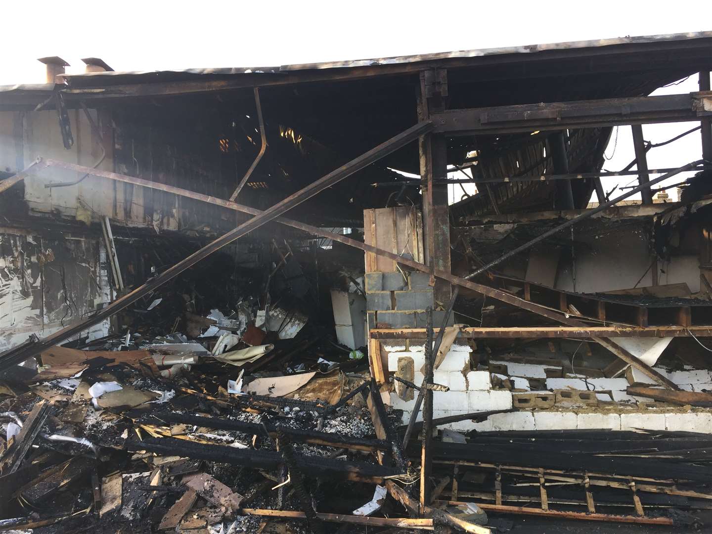 The aftermath of the cockle shed fire at Whitstable Harbour Picture: Brad Harper