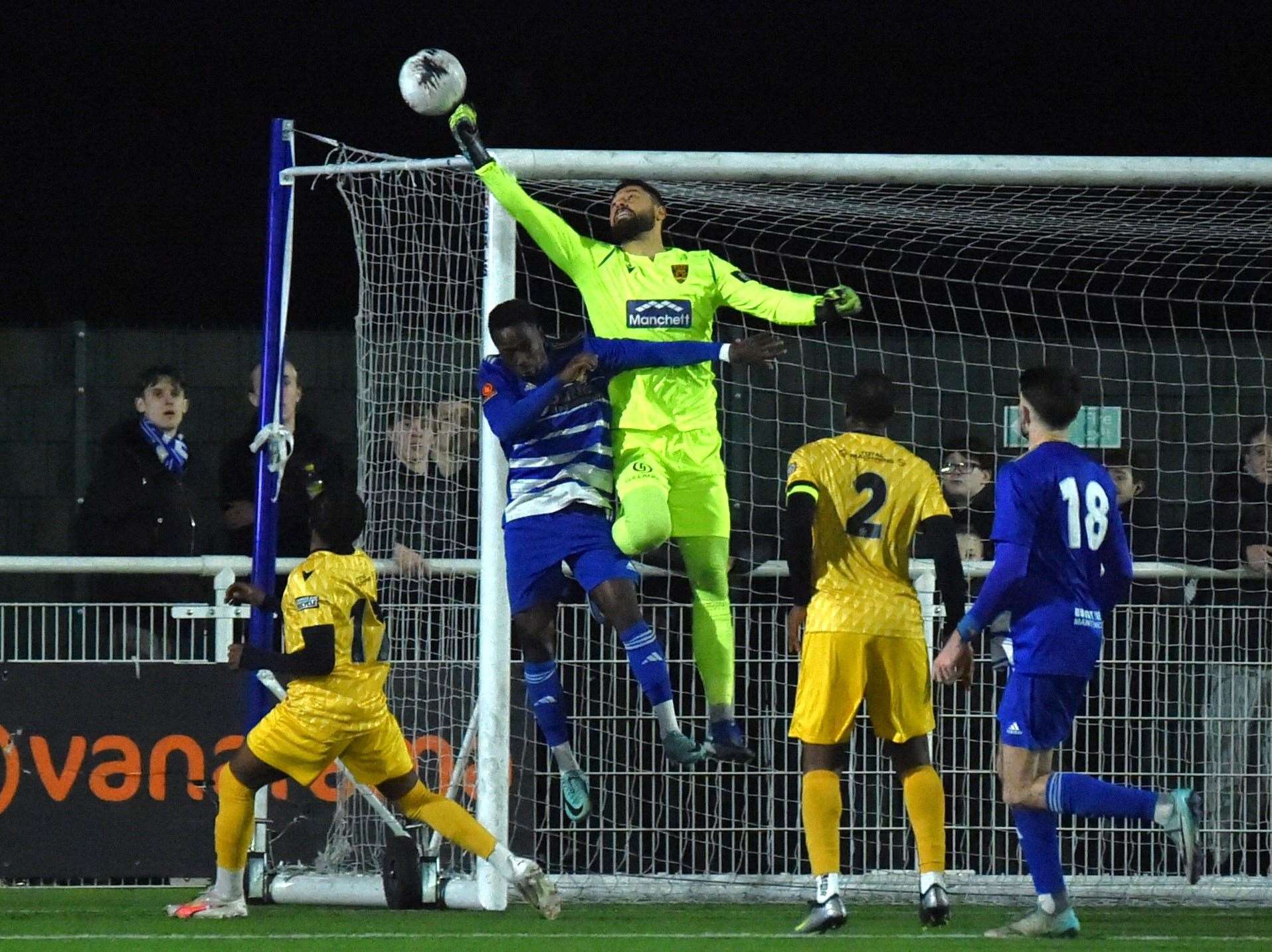 Maidstone keeper Lucas Covolan tips the ball over the bar. Picture: Steve Terrell