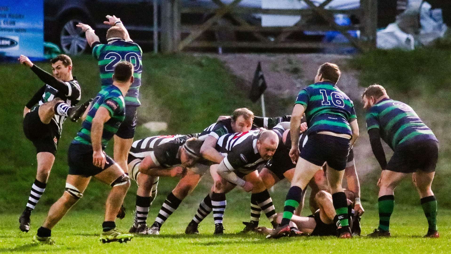 Matt Brady in the thick of the action as Gravesend and Old Reigatian battle it out. Picture: @jp_photographeruk