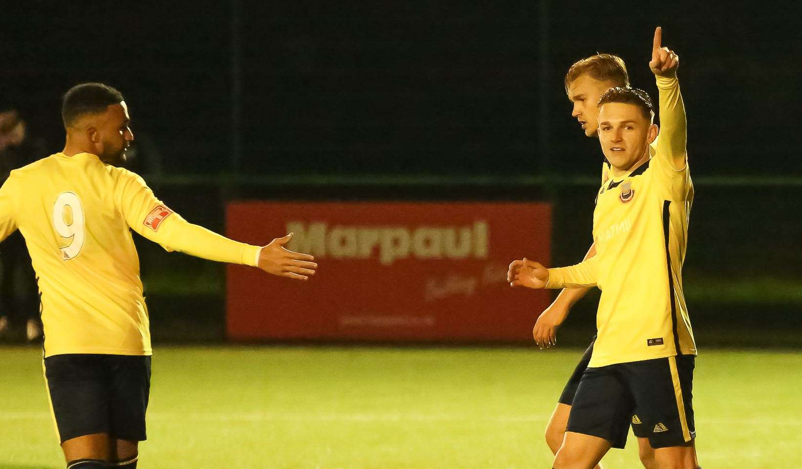 Josh Oliver celebrates scoring for Whitstable in their Challenge Cup win at Greenways. Picture: Les Biggs