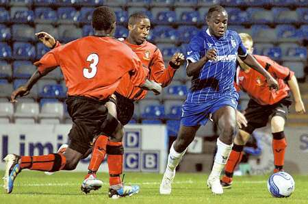 Nathan Nyafli tris to break through the Hayes &amp; Yeading defence