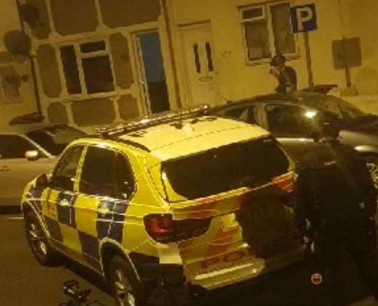 Police outside the property in Luton Road, Chatham, on Friday